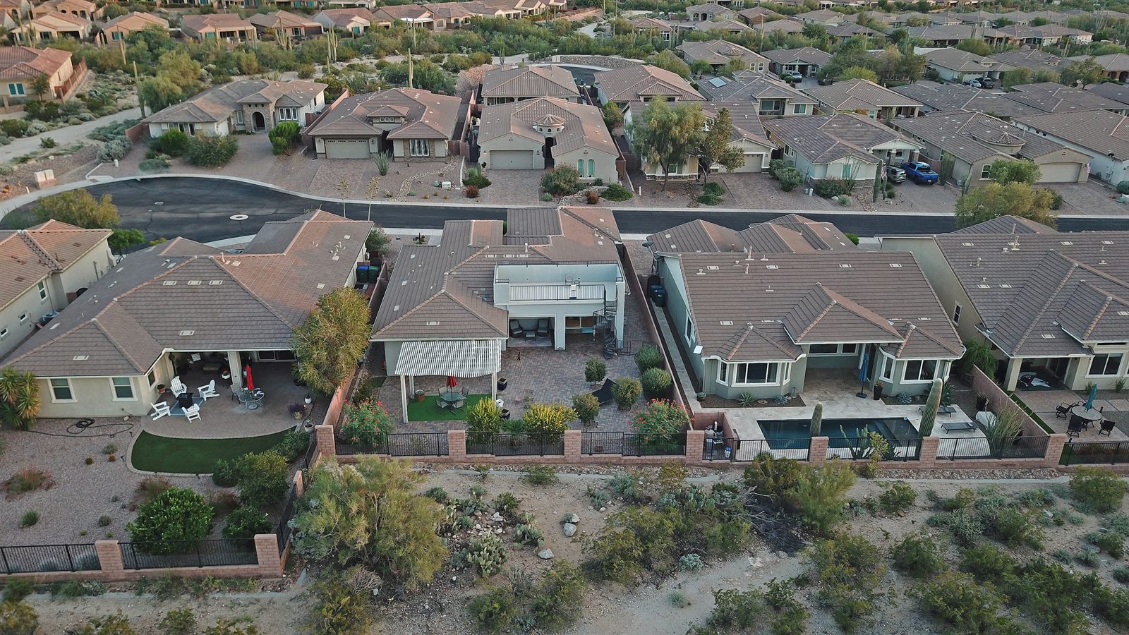 Daytime drone view over a Tucson-area neighborhood